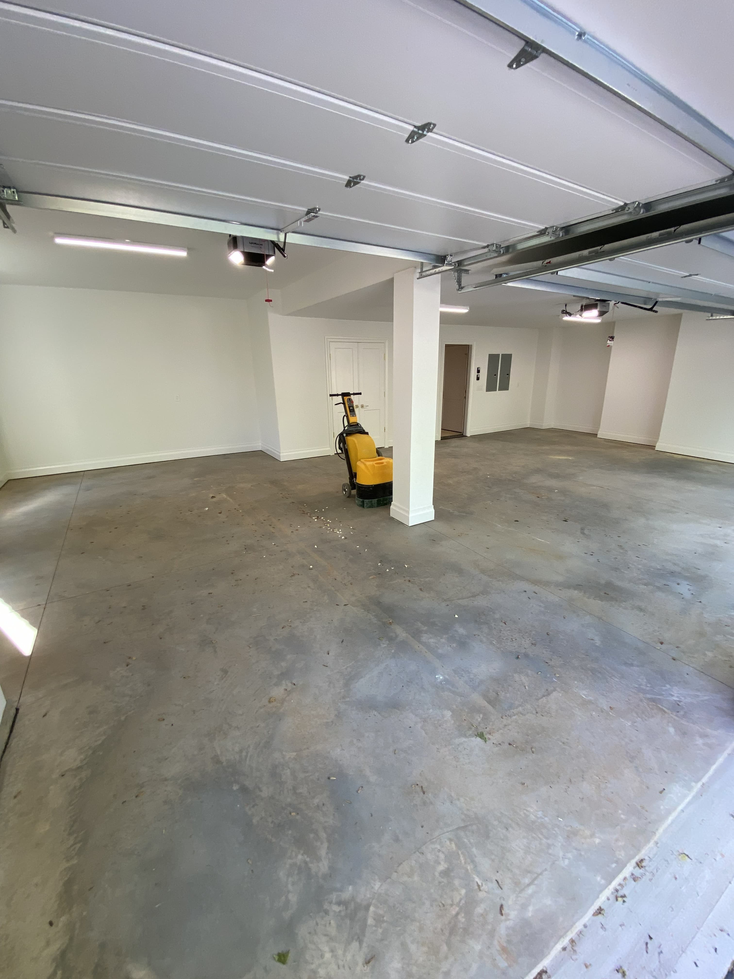 Bare concrete garage floor before epoxy coating — Raleigh NC