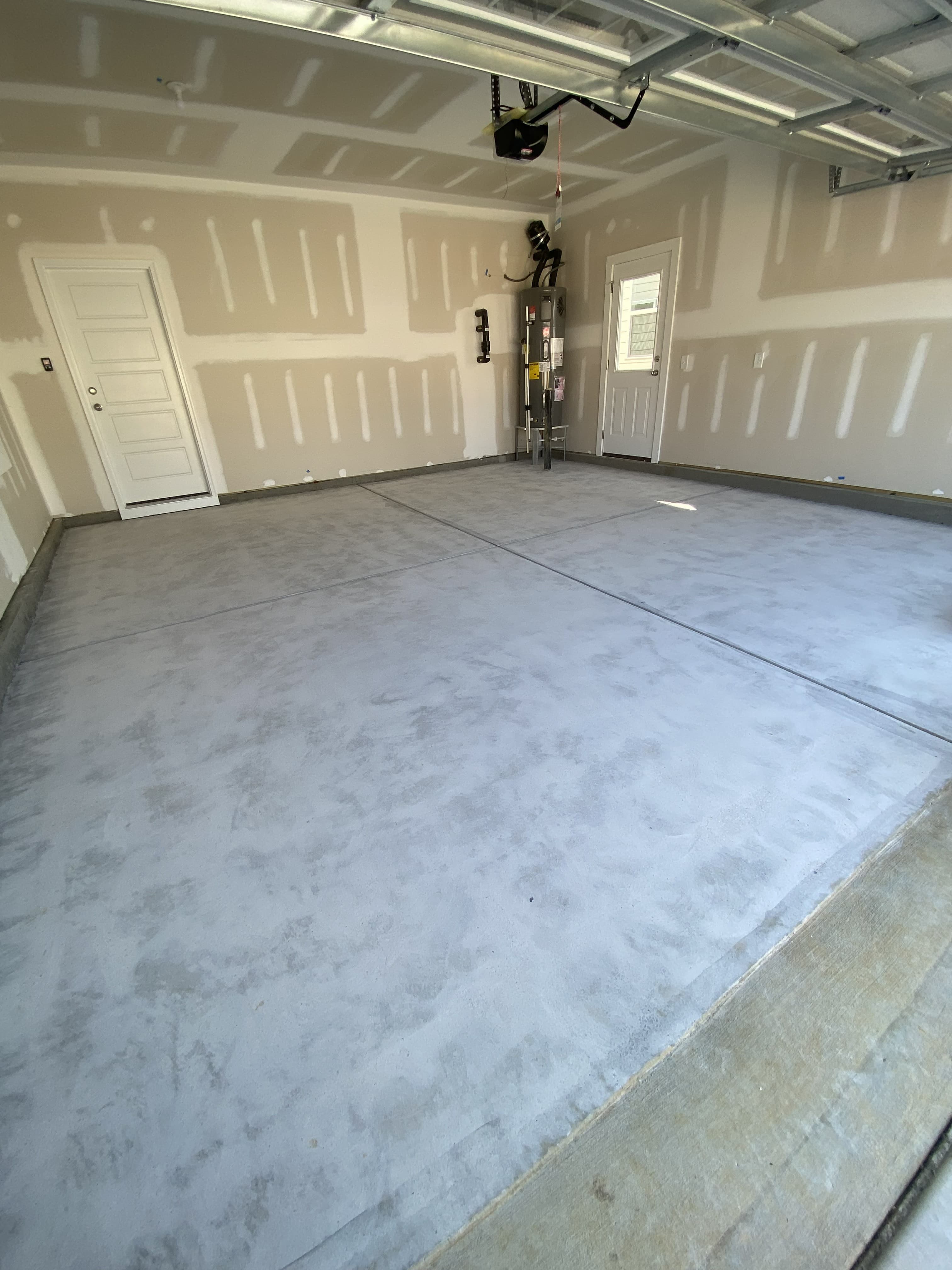 Bare concrete garage floor before epoxy coating — Raleigh NC